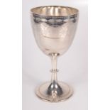 A Victorian engraved silver cup on beaded stem and foot by Augustus George Piesse London 1864, 12.