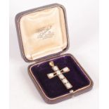 An opal set 9ct gold cross.