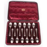 A set of twelve silver coffee spoons, Birmingham import mark 1907, cased.