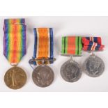 A pair of WWI medals to Pte 202526 F Burrows Devon Regiment, together with a pair of WWII medals.