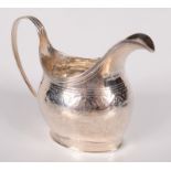 A silver George III helmet milk jug, London 1803, 2.9oz.