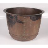 A large circular copper wash bowl, height 32cm, diameter 47cm.