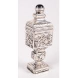 An engraved and embossed miniature European silver urn shaped pyx box,