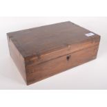 An Indian hardwood brass bound work box, circa 1900, the interior with a drop in tray, height 11cm,