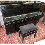 A Young Chang upright piano, overstrung and iron framed, E-108, in ebonised case frame no.