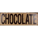 A painted wooden sign inscribed 'Chocolate', height 31.5cm, width 96cm.