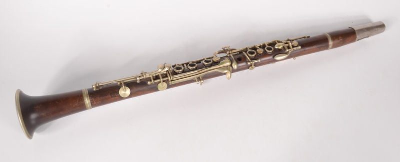 A clarinet, indistinct impressed mark, length 65cm.