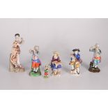 A pair of Samson of Paris porcelain figures, a boy with bagpipes, a girl with a lamb, height 11cm,