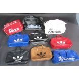 Nine retro Adidas sports holdalls, by Peter Black, circa 1970s, each with original label.