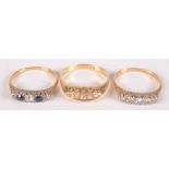 An 18ct gold Victorian five stone diamond ring, together with two other five stone rings,