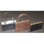 A black leather handbag with gilt metal mounts by Freedex,