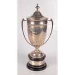 An ovoid twin handled silver trophy cup and cover inscribed for Grampound Road Horse Show,