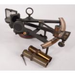 An ebonised and brass sextant, 19th century, with two extra lenses,
