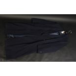 A gentleman's navy blue woollen Crombie overcoat, blue silk lining, size 14/16, length 135.