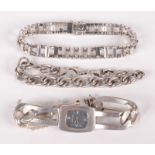 A silver Kicco ladies wristwatch and two silver bracelets.