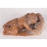 A Chinese carved soapstone figure of man, 19th century, embracing a dog of fo, height 3cm, length 6.