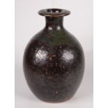 A Trevor Corser Leach pottery vase, with a tenmoku glaze, with TC monogram and Leach pottery seal,