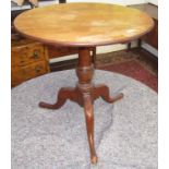 A George III mahogany tripod table,