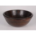 A treen bowl, late 19th/early 20th century, height 11cm, diameter 26.5cm.