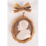 A 19th century Italian carved shell portrait of a pontiff in chased gold pendant mount,