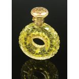 A rare Victorian high purity gold finger ring perfume bottle in cut lime flash glass,