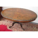 A Victorian walnut breakfast table,