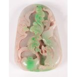 A Chinese green veined jade pendant carved with a bat, scrolling fungus and a mythical big cat,
