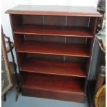 A Victorian mahogany bookcase, the rectangular moulded top above four shelves and a plinth base,