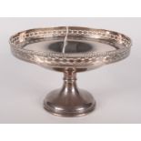 A silver cake stand with pierced rim, Chester 1908, 12.2oz.