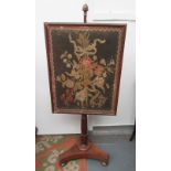 A William IV mahogany pole screen,