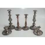 Two pairs of William IV silver plated Sheffield candlesticks, heights 31.