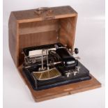 A Mignon AEG typewriter, in original wooden case.