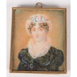 A Victorian miniature portrait painting of a lady, in a brass frame, 8 x 6.5cm.