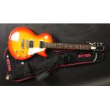 A Les Paul copy electric guitar, with case.