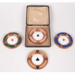 A set of four copper enamelled ashtrays, late 19th/early 20th century,