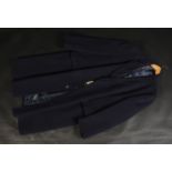 A gentleman's navy blue woollen Guards overcoat, blue silk lining, size 46R, length 116cm.