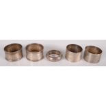 Five silver napkin rings, 3oz.