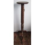 A George III mahogany torchiere,