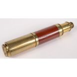 A brass and wooden three draw telescope, 19th century, extended length 87.5cm.