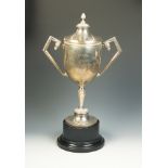 An impressive silver twin handled trophy cup and cover by William Neale retailed by Page Keen &