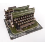 An Imperial green portable typewriter, manufactured by The Imperial Typewriter Co.