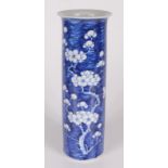 A Chinese blue and white prunus pattern cylindrical vase, late 19th century, height 30.