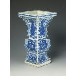 A Chinese blue and white porcelain dragon and phoenix vase, of archaic form,