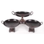 Three classical style metal, twin handled footed bowls, height 22cm, diameter 30.5cm.