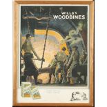 A Woodbines framed poster and three other posters.