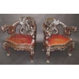A pair of Chinese hardwood armchairs, early 20th century,