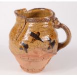 A Peter Smith pottery jug, seal marks, height 15cm.