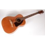 An Italian Eko acoustic guitar, full length 104cm, width 38cm, depth 9.3cm.