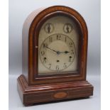 An inlaid mahogany mantle clock, early 20th century, the German movement signed Kienzle,