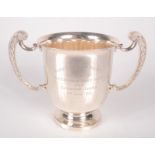 A Truro Exhibition Society silver twin handled cup 11.5oz, maximum height 14.6cm.